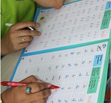 Close-up of handwriting practice on a Secret of Pen worksheet